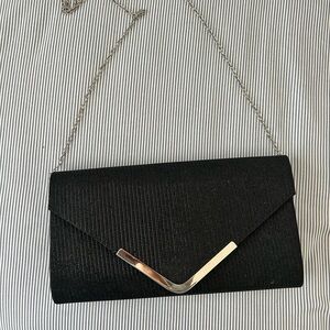 black and silver clutch purse